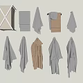 Neutral Colored Towels Hanging On Wall With Various Styles And Sizes For