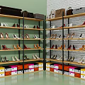 Multi tiered Metal Frame Shoe Rack With Various Shoes And Colorful Storage Boxes