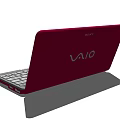 Slim Portable Laptop With Red Frame Gray Screen And White Keyboard Design
