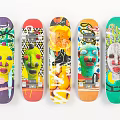 Colorful Skateboards Featuring Diverse Artistic Graphics And Creative Vibrant Designs