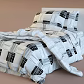 Single Bed with Black and White Plaid Bedspread and Matching Pillows for Modern Decor