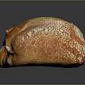 Freshly Baked Golden Crust Loaf of Bread with Flour Dusted Surface