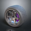 Car Tire With Silver Wheel Rim And Purple Brake Caliper Design