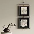 Black Framed Abstract Artworks On Wall With Dried Flower Vase Decor