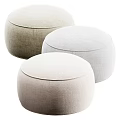 Two Beige Round Fabric Ottomans with Soft Surface for Modern Minimalist Home Decor