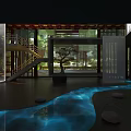 Modern Indoor Courtyard Space With Blue Water Flow Black Floor Round Stones And Wooden Structure