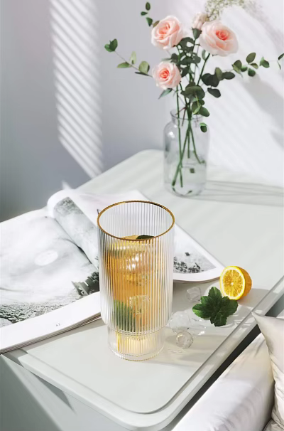 Gold Rimmed Striped Glass With Iced Tea Lemon Slice And Mint On White Tabletop 3d model