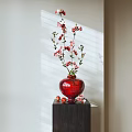 Red Vase with Red Flowers and Small Red Fruits on Dark Stand with Sunlight Shadows