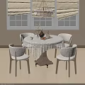 Round Dining Table With White Lace Tablecloth Tea Set Vase And Light Wood Chairs