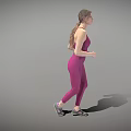 Woman In Pink Sports Bra And Leggings Running Against Gray Background