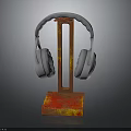 Gray Over Ear Headphones On Red Rusted Metal Stand With Stable Base