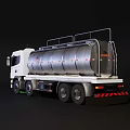 White Utility Tanker Truck With Large Silver Storage Tank And Multiple Wheels