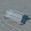 Outdoor Gray Bench With Metal Frame And Wooden Slats On Slate Floor
