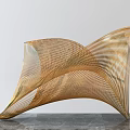 Modern Gold Wire Sculpture With Intricate Woven Lines And Dynamic Curved Shape