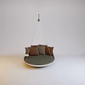 Hanging Chair Minimalist Round Design With Soft Brown Cushions Suspended By White Ropes For Indoor Relaxation