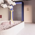 Playful Indoor Space With Hanging Clouds Giraffe Sculpture Pink Ball Pit And Blue Door Frame