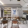 Modern Open Concept Dining And Living Area With Grey Kitchen Cabinets And Marble Walls