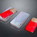 Three Stylish Decorative Storage Boxes With Red And Silver Metallic Patterns For Home Furniture