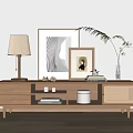 Modern Wooden TV Stand With Drawers Glass Doors Table Lamp Photo Frames And Green Plant