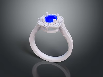 Exquisite White Metal Ring with Central Blue Gemstone Surrounded by Sparkling Diamond Accents 3d model