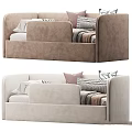 Two seater sofa in beige and brown with striped geometric pillows and folded blankets