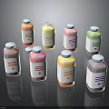 Colorful Bottled Food Drinks With White Labels And Varied Hues On Black Surface