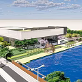Modern Building Exterior With Waterfront Green Landscape Trees And Pathway