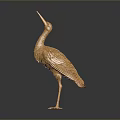 Elegant Golden Crane Sculpture with Detailed Feathers on Dark Background