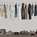 Clothes Hanging On Hangers With Various Styles And Shoes Bags Storage Boxes Below