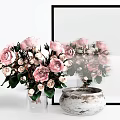 Fresh Pink Roses In Transparent Glass Vase And White Textured Ceramic Pot With Decorative Frame