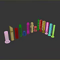 Assorted Colored Cylindrical Objects Including Striped And Solid Designs On
