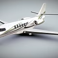 White Private Jet With Green Accents And Sleek Exterior Design Features