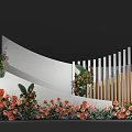 Floral Display With Orange Flowers Green Foliage Curved White Wall And Vertical Slats