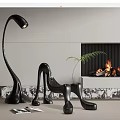 Modern Black Single Chair With Curved Design And Fireplace In Living Room