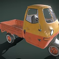 Yellow and Orange Tricycle Utility Vehicle with Cab and Cargo Bed
