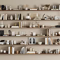 Minimalist Decorative Ornament Collection On Wooden Shelves With Books Vases Sculptures And Frames