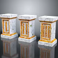 Three Ornamental Stone Columns With White Pedestals And Yellow Decorative Patterns