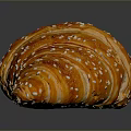 Golden Brown Croissant With Sesame Seeds On Black Reflective Background