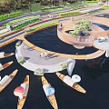 Scenic Waterfront Landscape With Curved Walkway Boats Trees And People