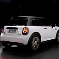 White Small Car With Black Roof Yellow Side Mirrors And Stylish Wheel Design
