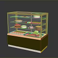 Assorted Desserts in Glass Display Case with Multiple Shelves and Golden Frame