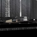 Modern Landscape Wall With Textured Stone And Water Reflection In Outdoor Space