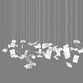Creative Chandelier With White Book Page Shaped Elements Hanging On Thin Wires Against Black Background