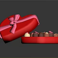 Open Red Heart Shaped Box With Pink Ribbon Bow And Assorted Chocolates