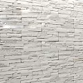 White Stone Wall Featuring Natural Textured Bricks in Modern Interior Design