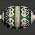 Green And Silver Decorative Container With Ornate Curved Patterns And Colorful Dots