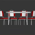 Oval Outdoor Table With White Tabletop Metal Frame And Four Red White Chairs