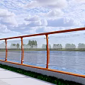 Glass Railing With Orange Frame Along River View And Green Trees Under Cloudy Sky 3d model