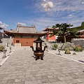Traditional Chinese Ancient Architecture With Eaves Roofs Red Walls Wooden Doors Courtyard And Stone Steps