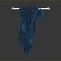 Soft Blue Bath Towel Hanging On White Wall Mounted Towel Rack